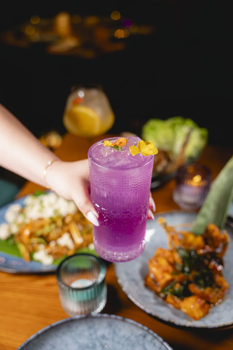 A purple signature cocktail